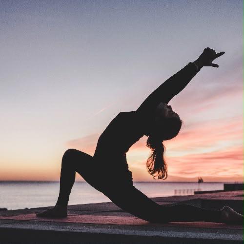 Sunset yoga session on the beach in Kalpitiya